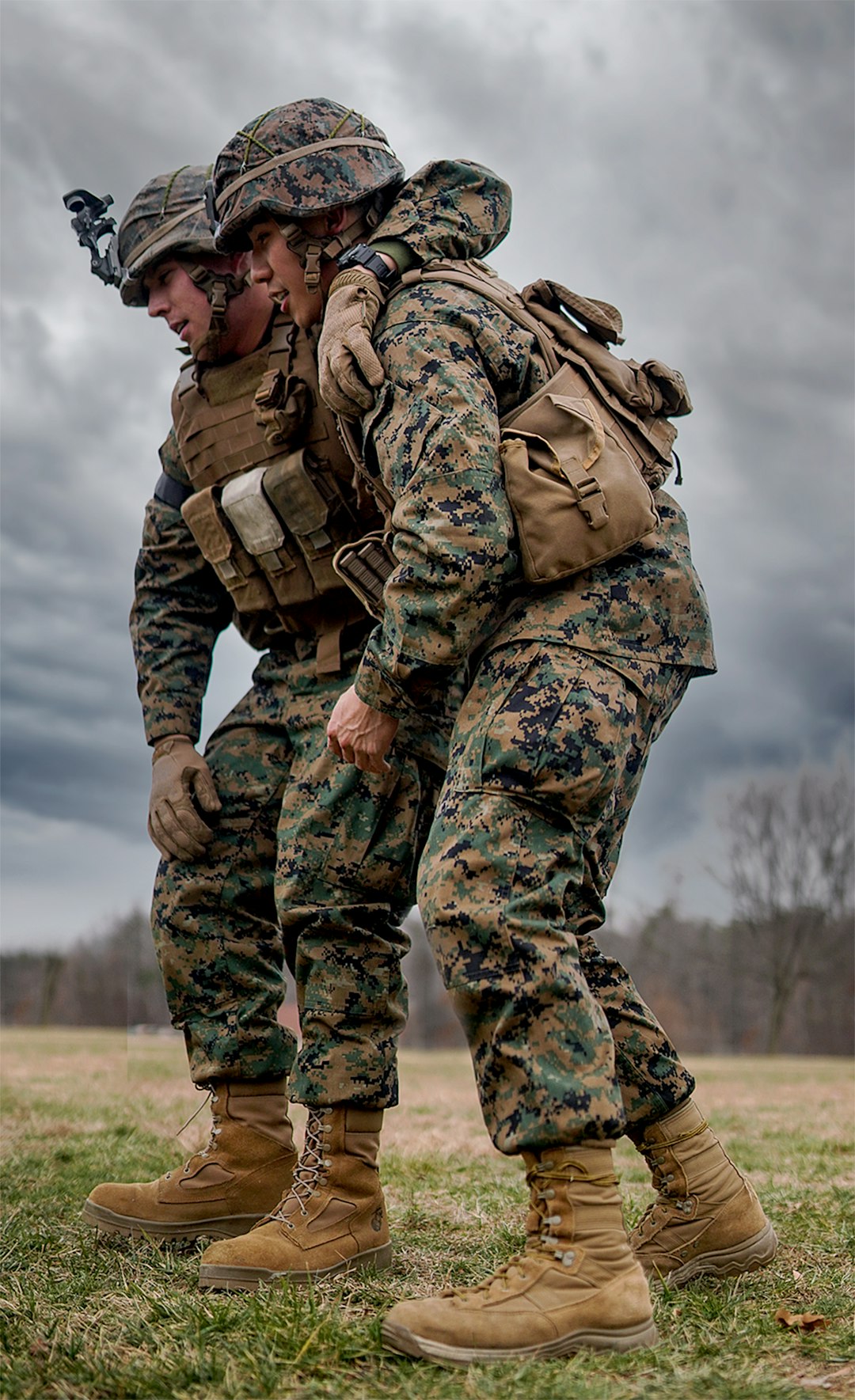 creative-02 Two 2nd Lieutenants at The Basic School, Camp Barrett, practice an ambulatory carry during a Tactical Combat Casualty Care Excersize.